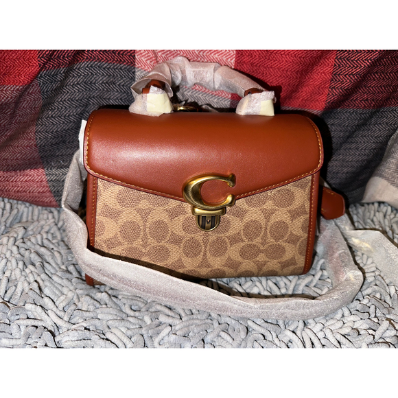Coach Handbags - Coach Sammy Top Handle 21 In Signature Canvas in Brown